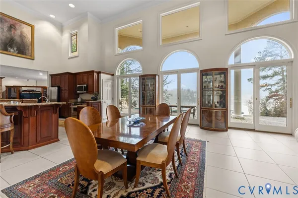 a bathroom with a sink a light fixture and a mirror
