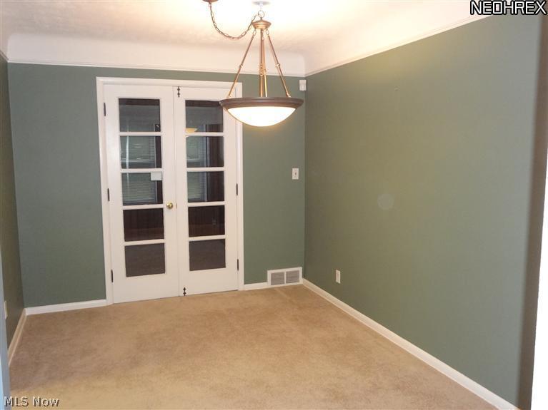 1315 Haverston Road Lyndhurst, OH 44124 - Photo 5 of 15 DINING RM opens to 3 season rm