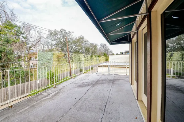 a view of balcony with ocean