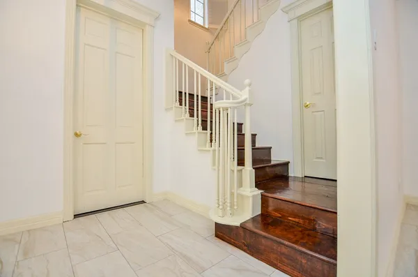 a view of a hallway view with staircase