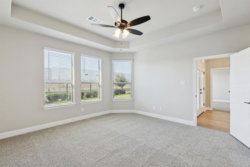 1366 Chisos Way Forney, TX 75126 - Photo 18 of 38 a view of an empty room with a window