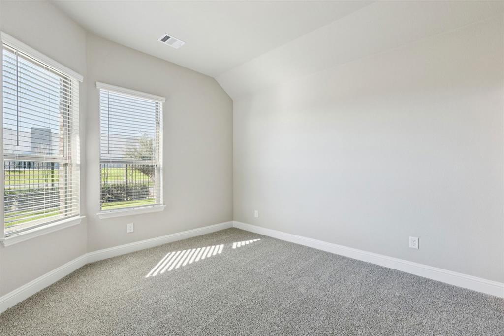 1366 Chisos Way Forney, TX 75126 - Photo 22 of 38 an empty room with a window