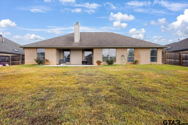 a house view with a outdoor space