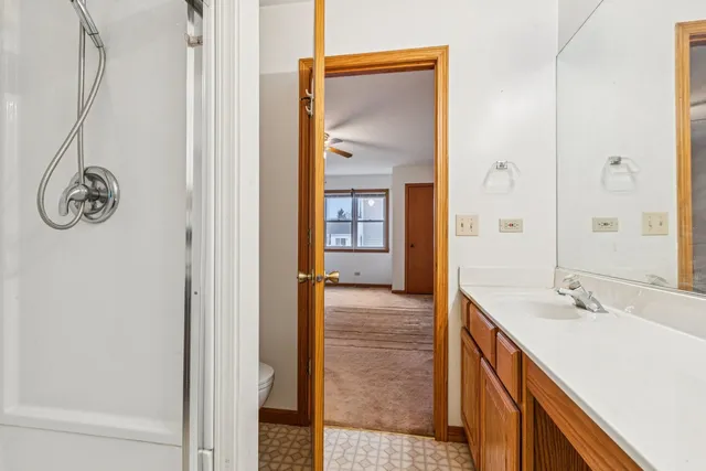 a bathroom with a sink and mirror