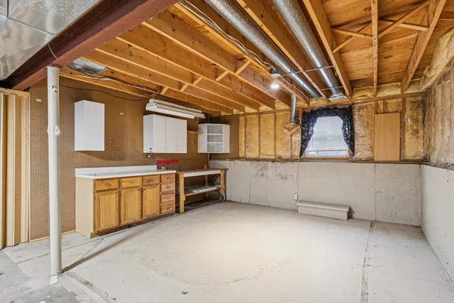 a view of a kitchen with cabinets