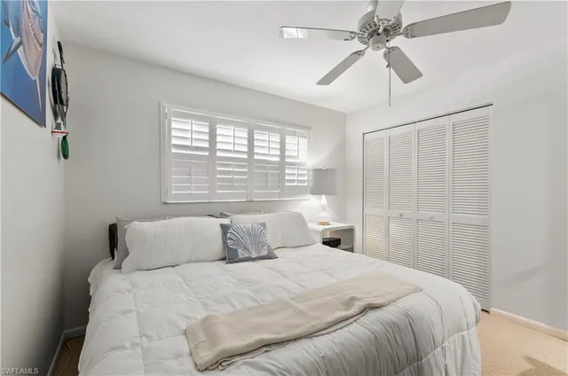 a view of a swimming pool with a lounge chair