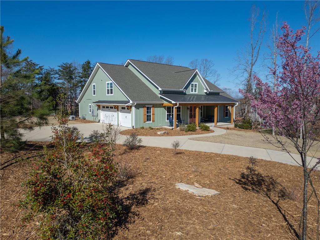 113 South Oak Pointe Drive Seneca, SC 29672 - Photo 1 of 50 This charming home offers a spacious yard and inviting curb appeal.