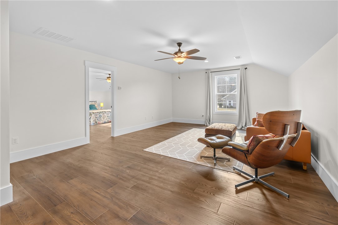 113 South Oak Pointe Drive Seneca, SC 29672 - Photo 28 of 50 This bright and open room features rich flooring and ample space for relaxation.