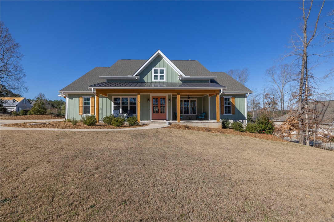 113 South Oak Pointe Drive Seneca, SC 29672 - Photo 3 of 50 This charming home showcases a welcoming front porch, perfect for enjoying peaceful afternoons.