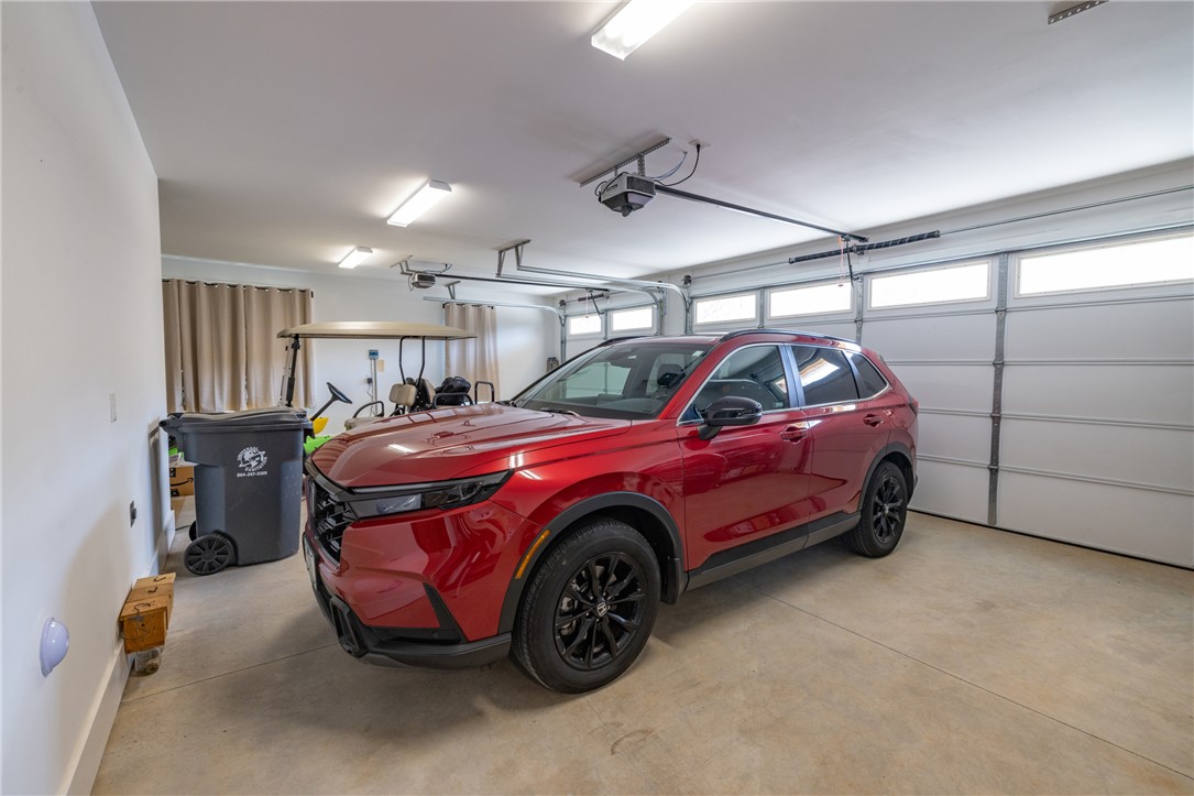 113 South Oak Pointe Drive Seneca, SC 29672 - Photo 31 of 50 This spacious garage offers ample room and convenience for your vehicle and storage needs.