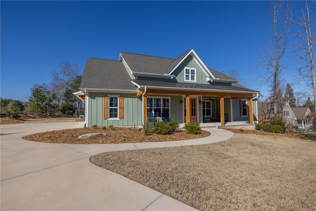 113 South Oak Pointe Drive Seneca, SC 29672 - Photo 49 of 50 This charming residence features a broad front porch and an inviting driveway.