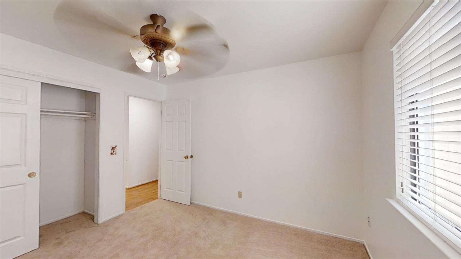 1712 Poppy Meadow Court Coalinga, CA 93210 - Photo 21 of 30 a view of an empty room with a window