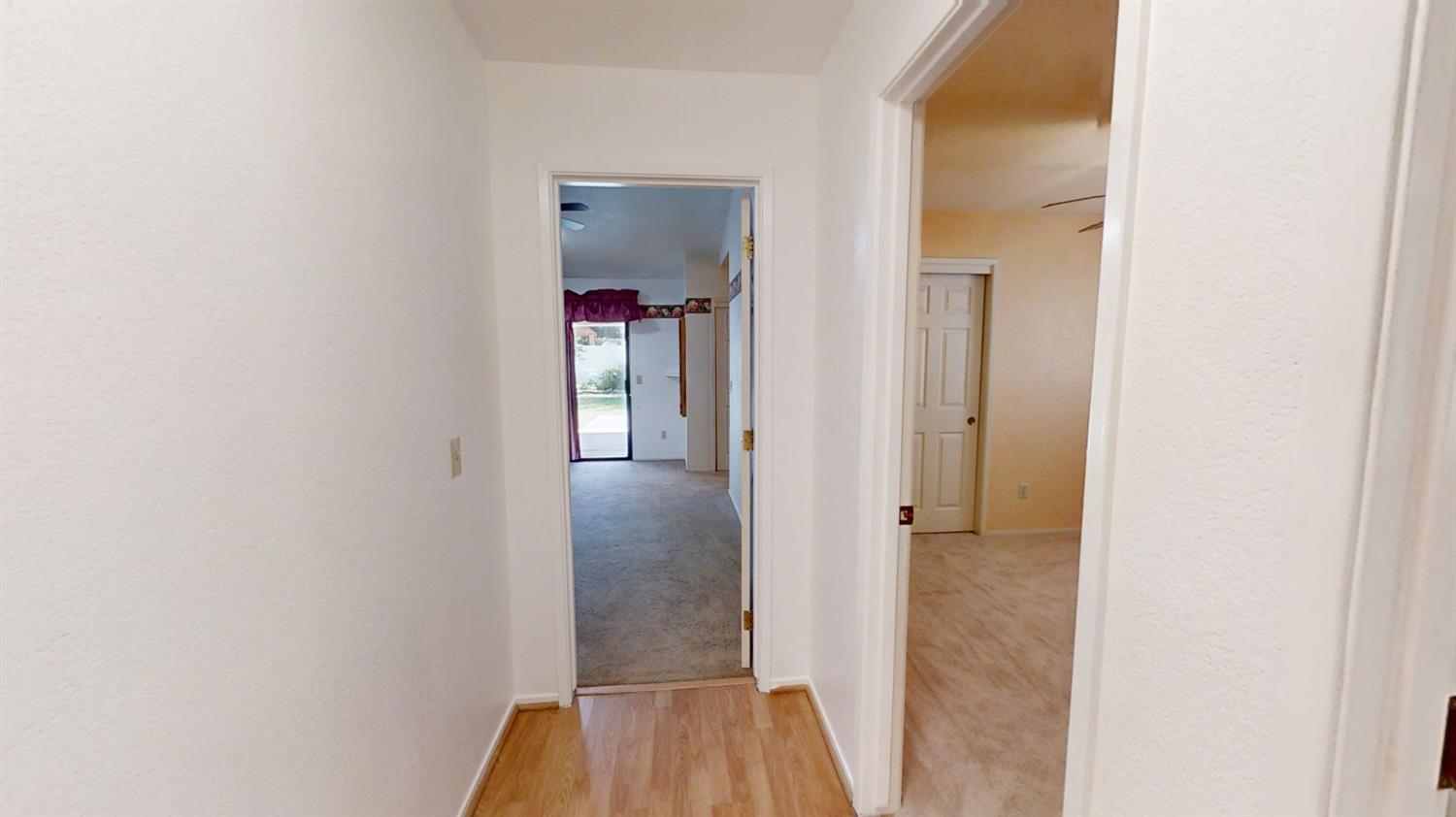 1712 Poppy Meadow Court Coalinga, CA 93210 - Photo 22 of 30 wooden floor in a gallery