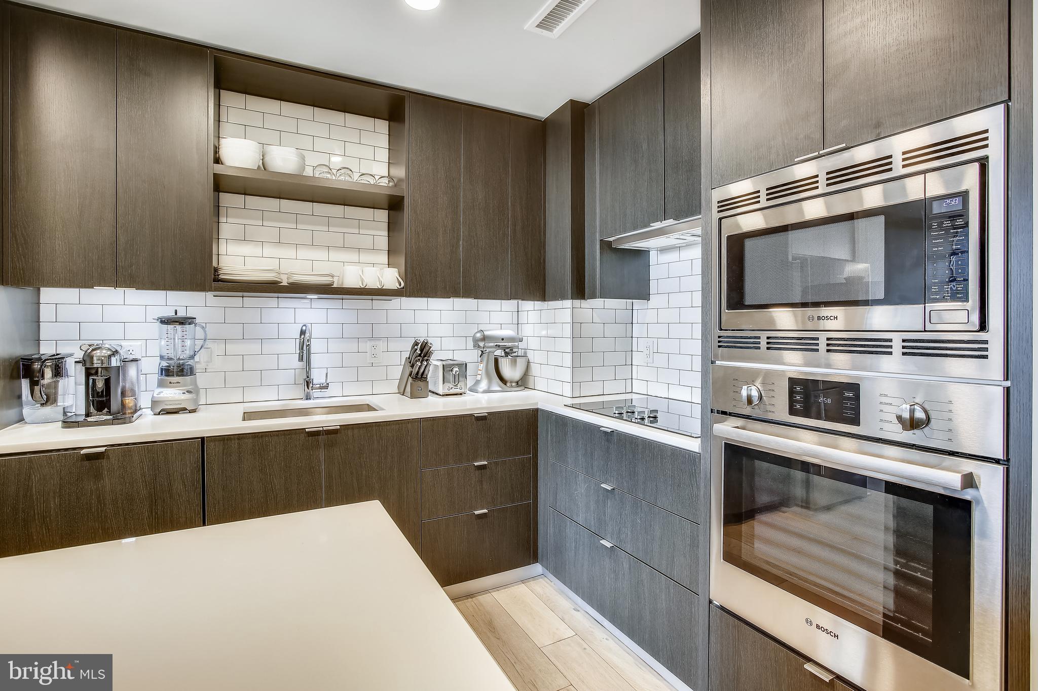 1300 4th Street Southeast, Unit 408 Washington, DC 20003 - Photo 19 of 57 Kitchen with contemporary Italian cabinetry