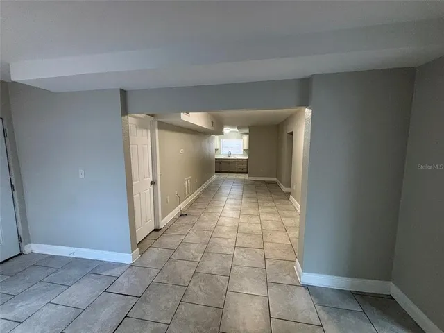 a view of an empty room and window