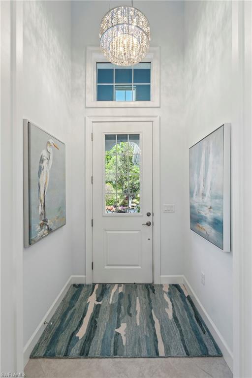 5690 Elbow Avenue Naples, FL 34113 - Photo 19 of 39 an empty room with window