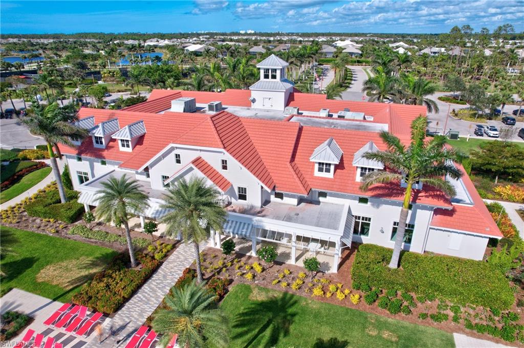 5690 Elbow Avenue Naples, FL 34113 - Photo 31 of 39 an aerial view of a houses with a yard