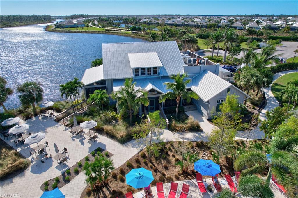 5690 Elbow Avenue Naples, FL 34113 - Photo 35 of 39 an aerial view of a house with a yard