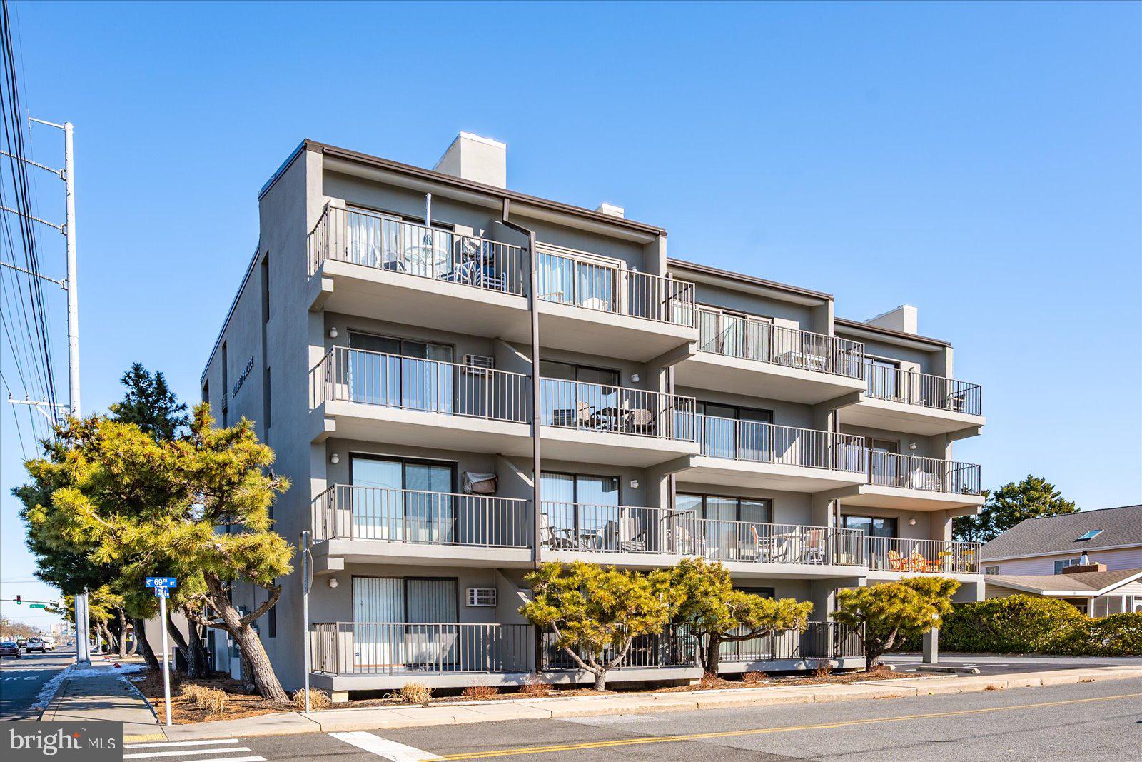 a front view of a building with street view
