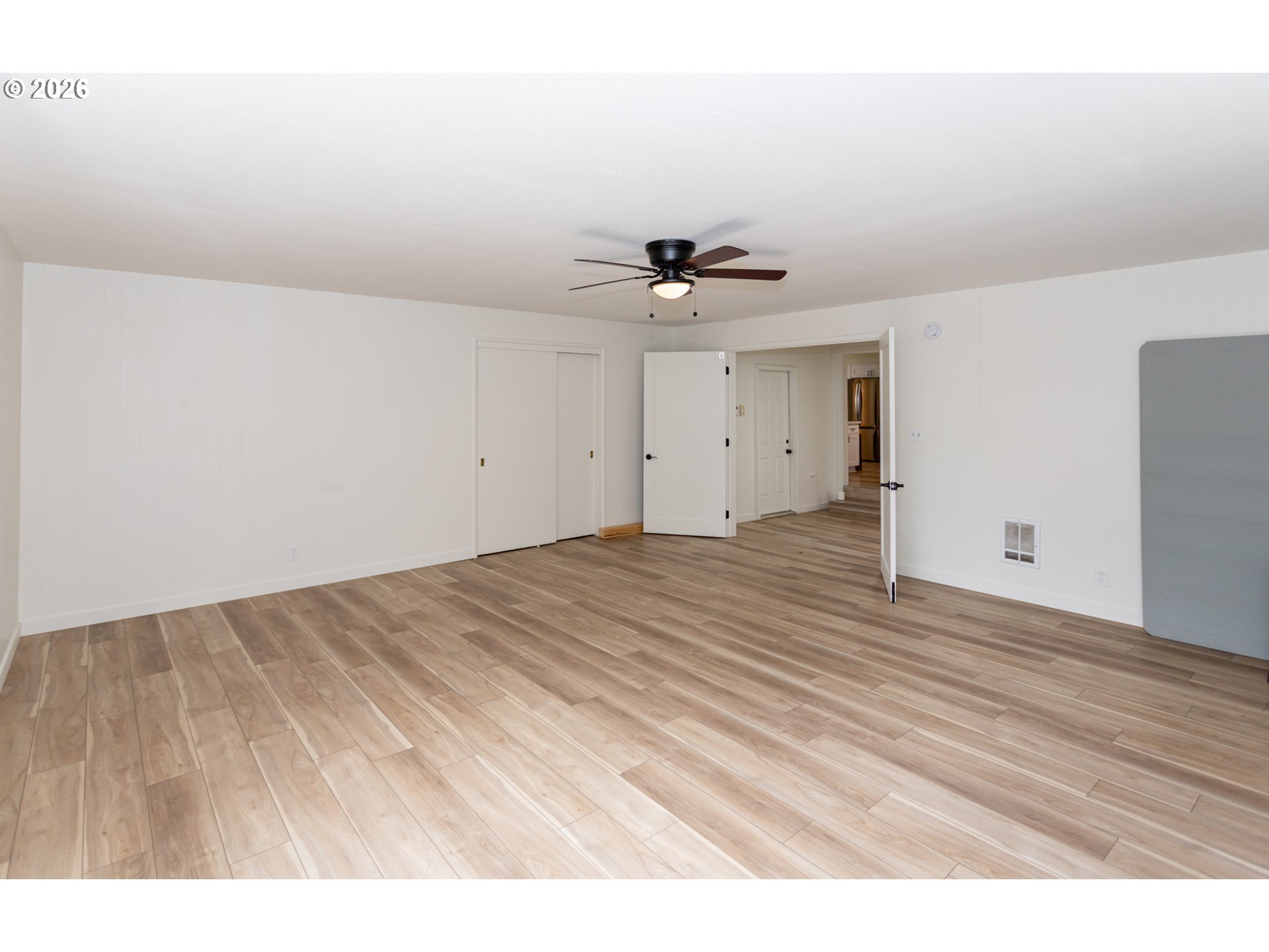 675 Hughes Street Eugene, OR 97402 - Photo 26 of 40 a view of a room with a wooden floor