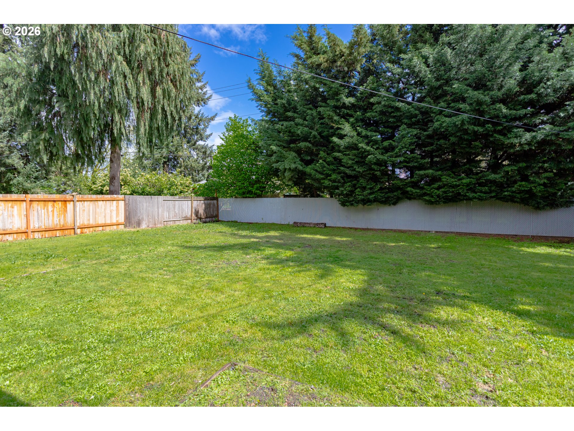 675 Hughes Street Eugene, OR 97402 - Photo 36 of 40 a view of swimming pool with a yard