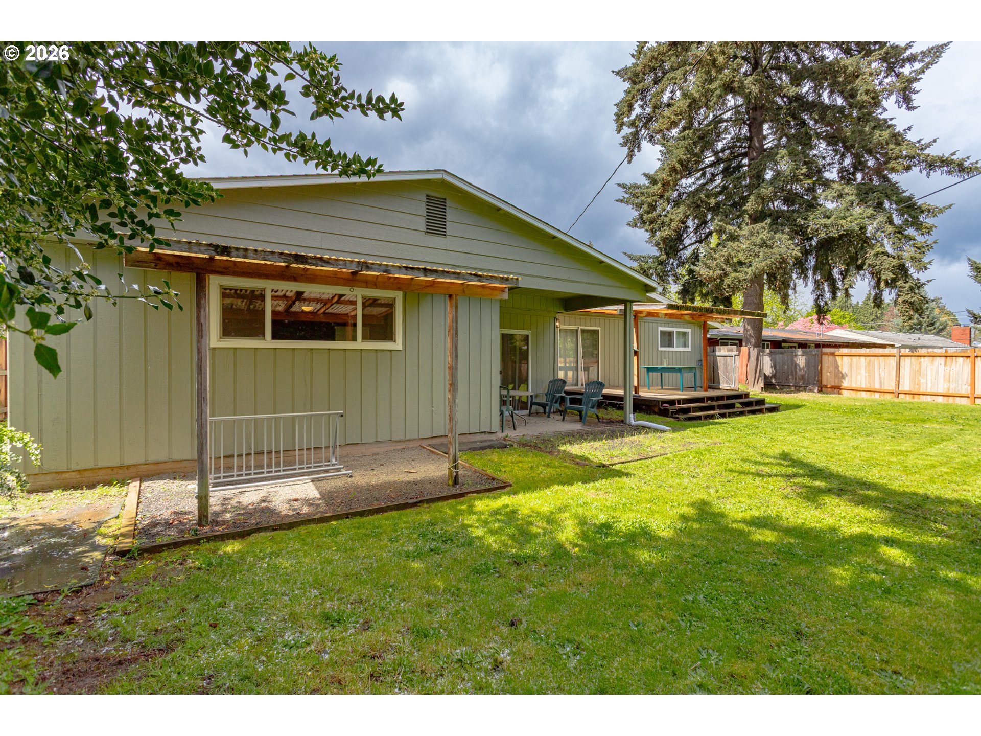 675 Hughes Street Eugene, OR 97402 - Photo 37 of 40 a view of a house with a yard