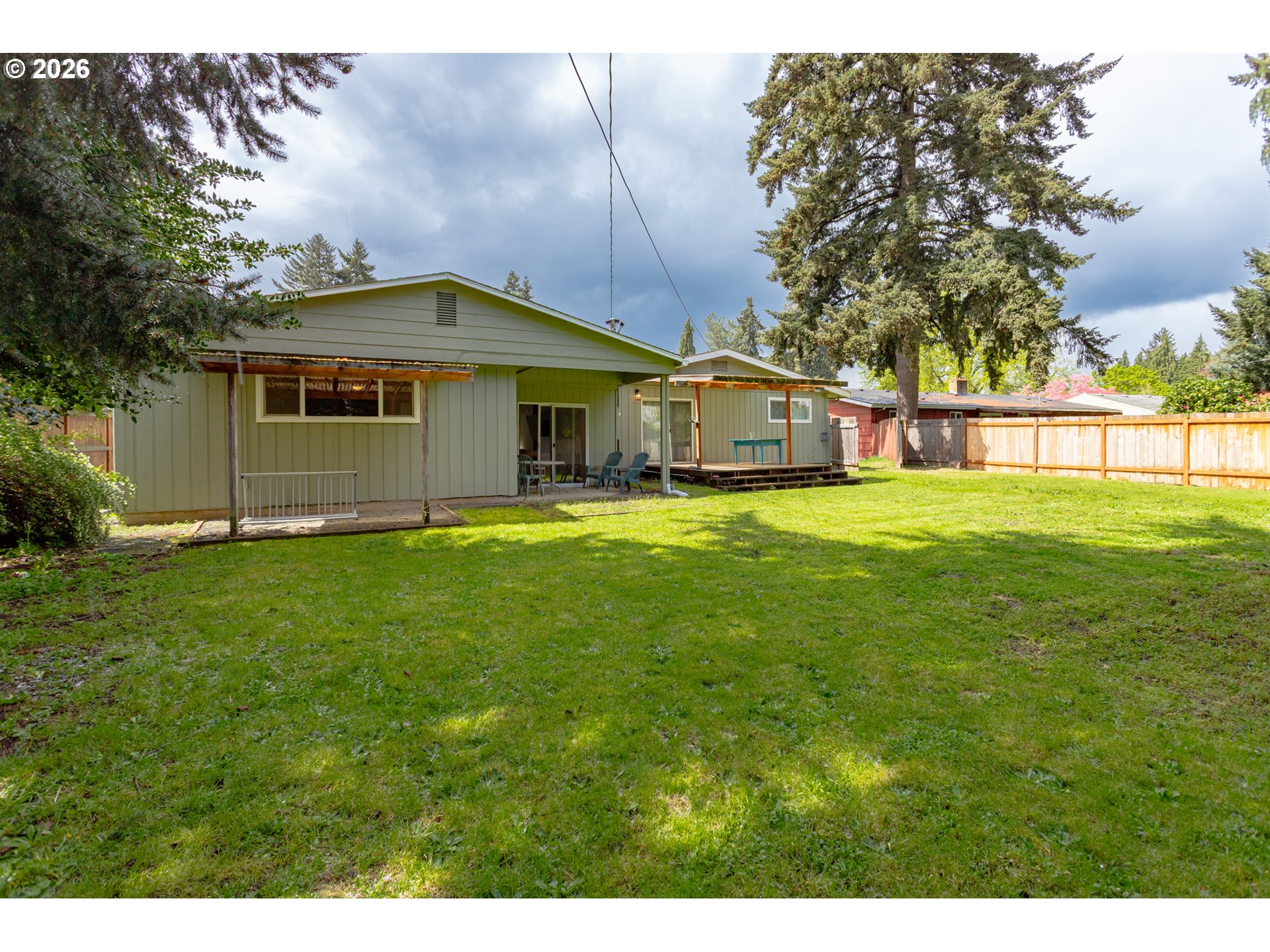 675 Hughes Street Eugene, OR 97402 - Photo 39 of 40 a house view with swimming pool in front of it