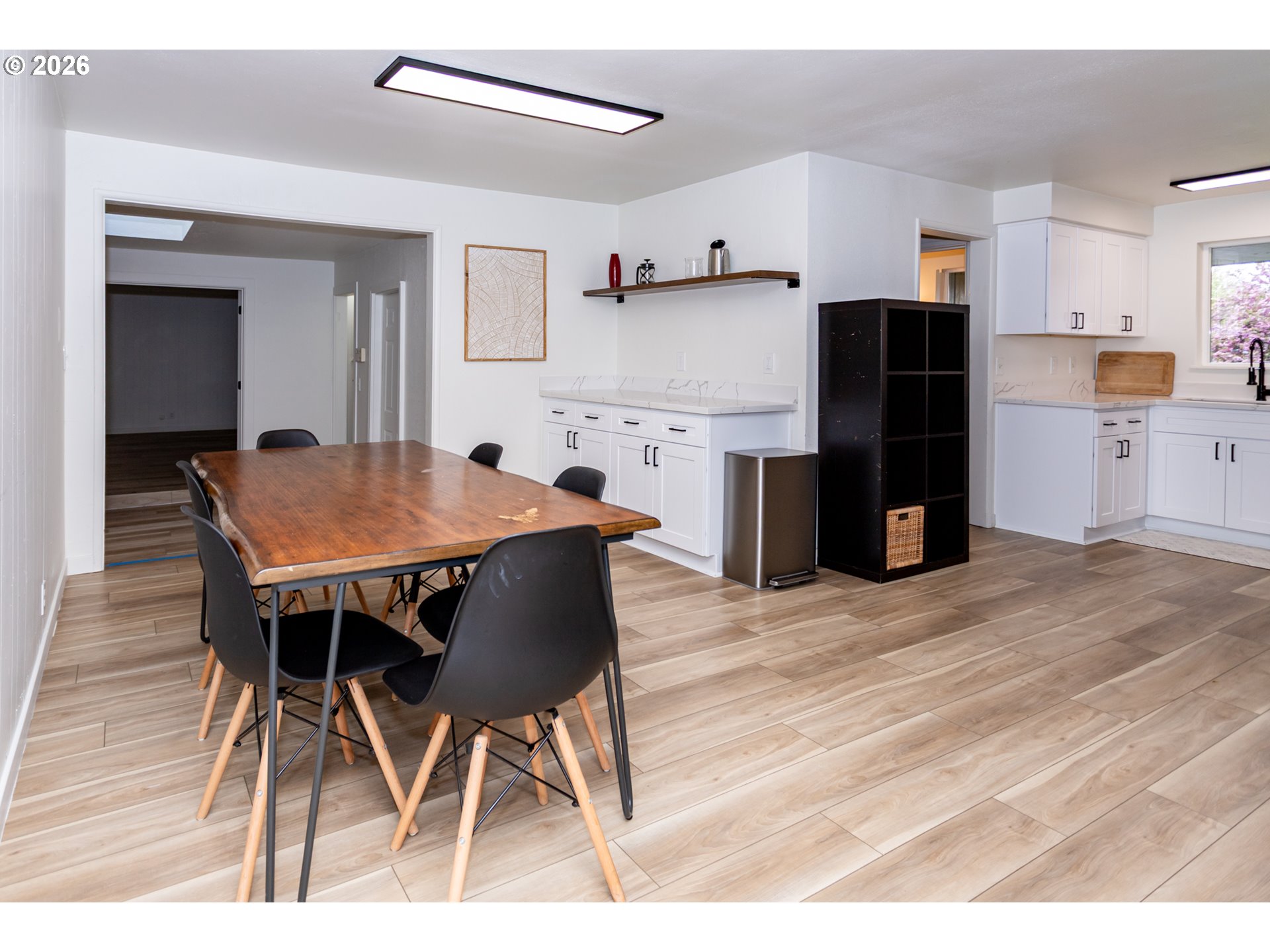 675 Hughes Street Eugene, OR 97402 - Photo 9 of 40 a kitchen with a wooden table and chairs