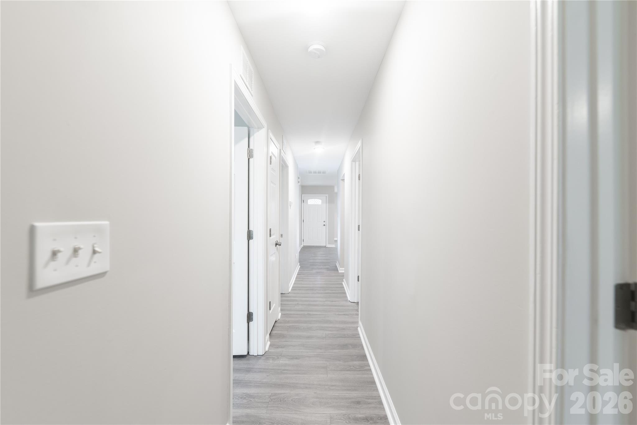837 Rodey Avenue, Unit 20 Charlotte, NC 28206 - Photo 5 of 12 a view of a hallway with wooden floor