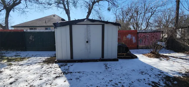 a view of a barn with a yard