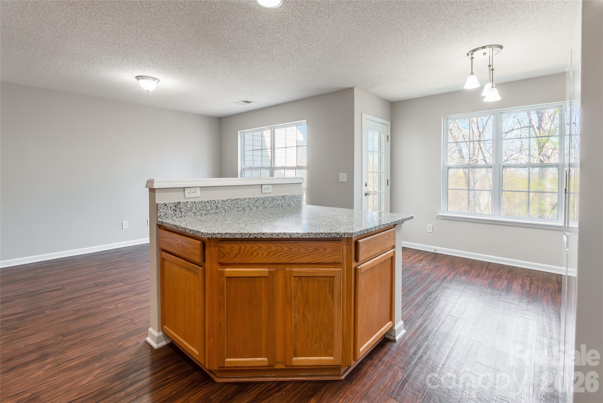 3167 Caldwell Ridge Parkway Charlotte, NC 28213 - Photo 11 of 36 a view of kitchen and wooden floor