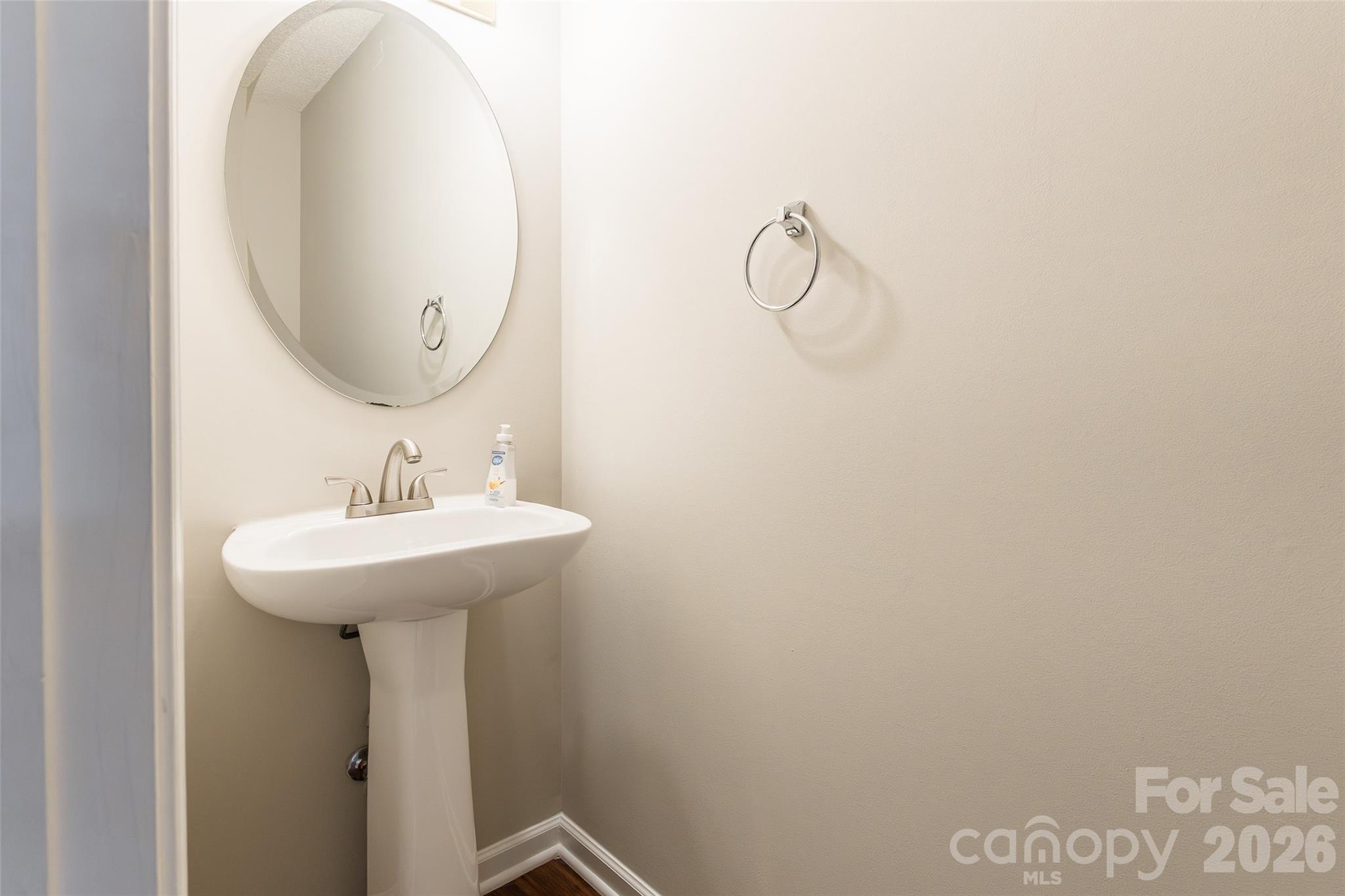 3167 Caldwell Ridge Parkway Charlotte, NC 28213 - Photo 14 of 36 a bathroom with a sink and mirror
