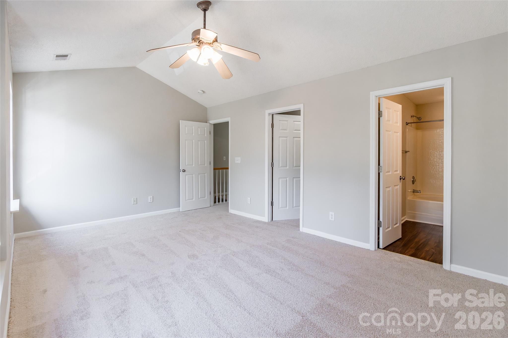 3167 Caldwell Ridge Parkway Charlotte, NC 28213 - Photo 17 of 36 a view of an empty room with a chandelier fan