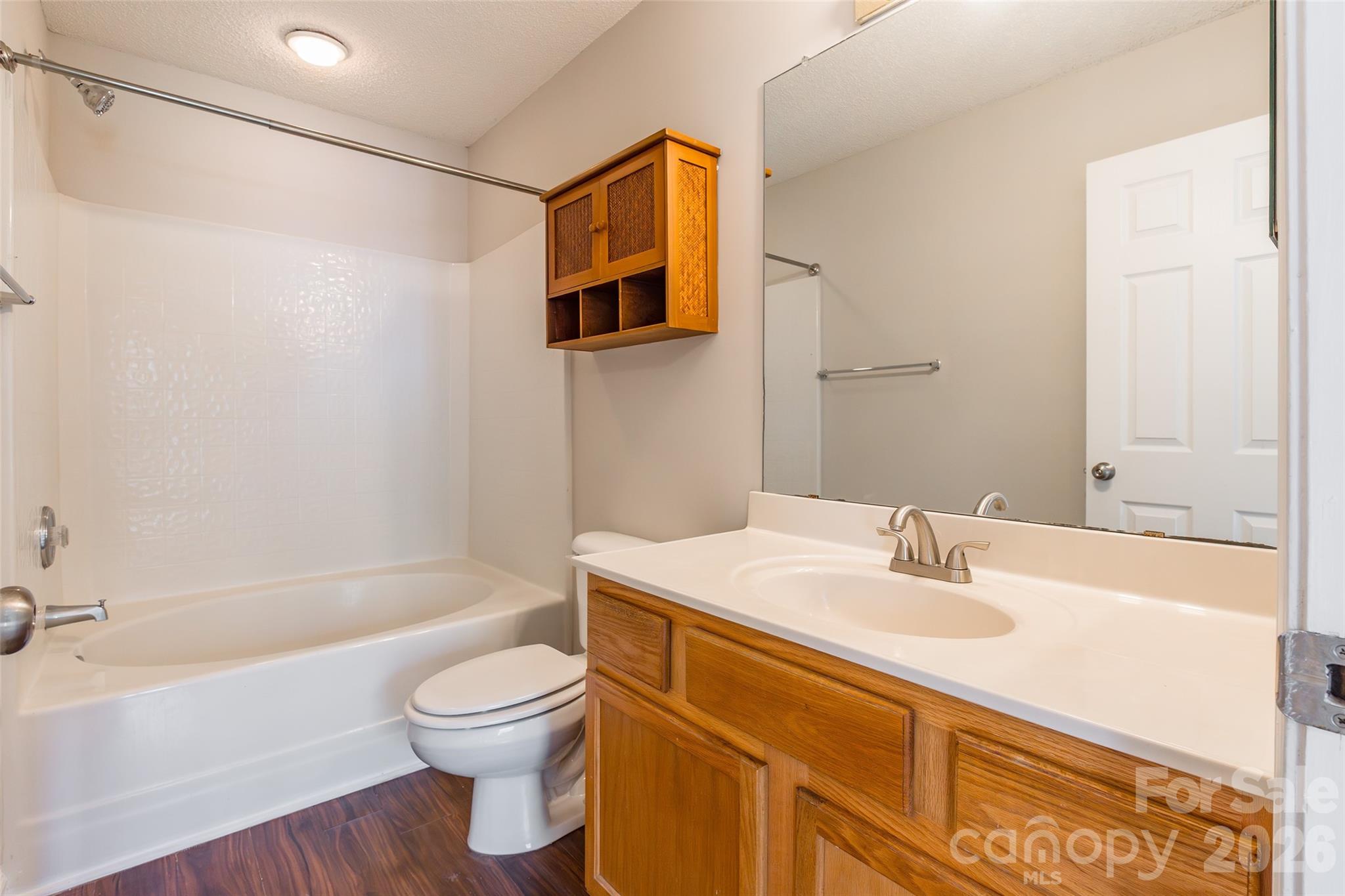 3167 Caldwell Ridge Parkway Charlotte, NC 28213 - Photo 18 of 36 a bathroom with a sink a toilet and shower