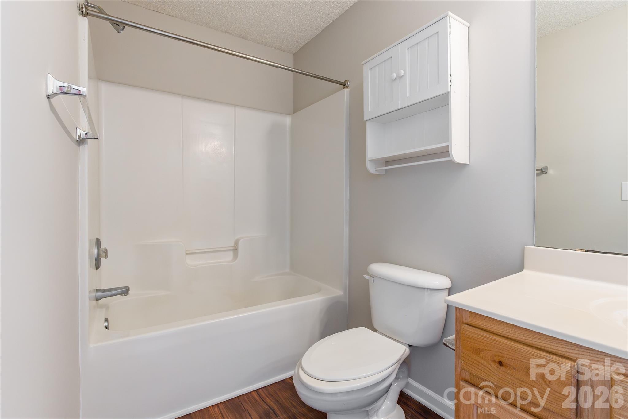 3167 Caldwell Ridge Parkway Charlotte, NC 28213 - Photo 22 of 36 a white toilet sitting next to a bath tub