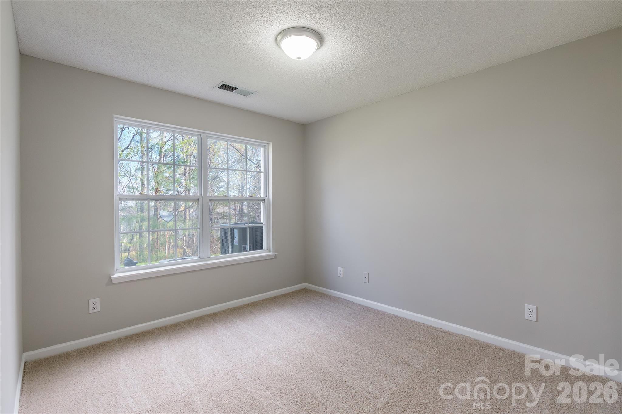 3167 Caldwell Ridge Parkway Charlotte, NC 28213 - Photo 28 of 36 an empty room with a window