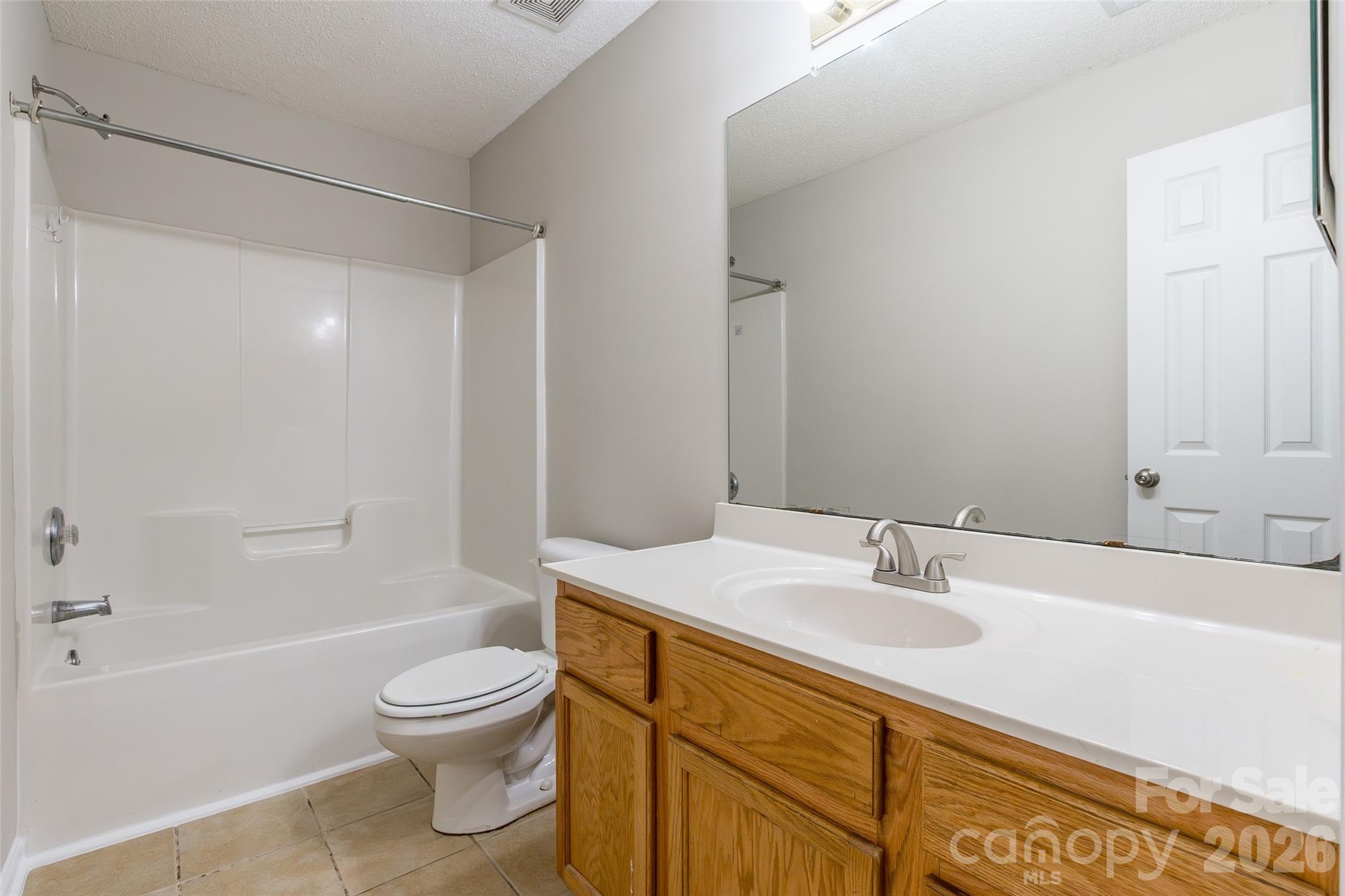 3167 Caldwell Ridge Parkway Charlotte, NC 28213 - Photo 30 of 36 a bathroom with a sink a toilet and shower