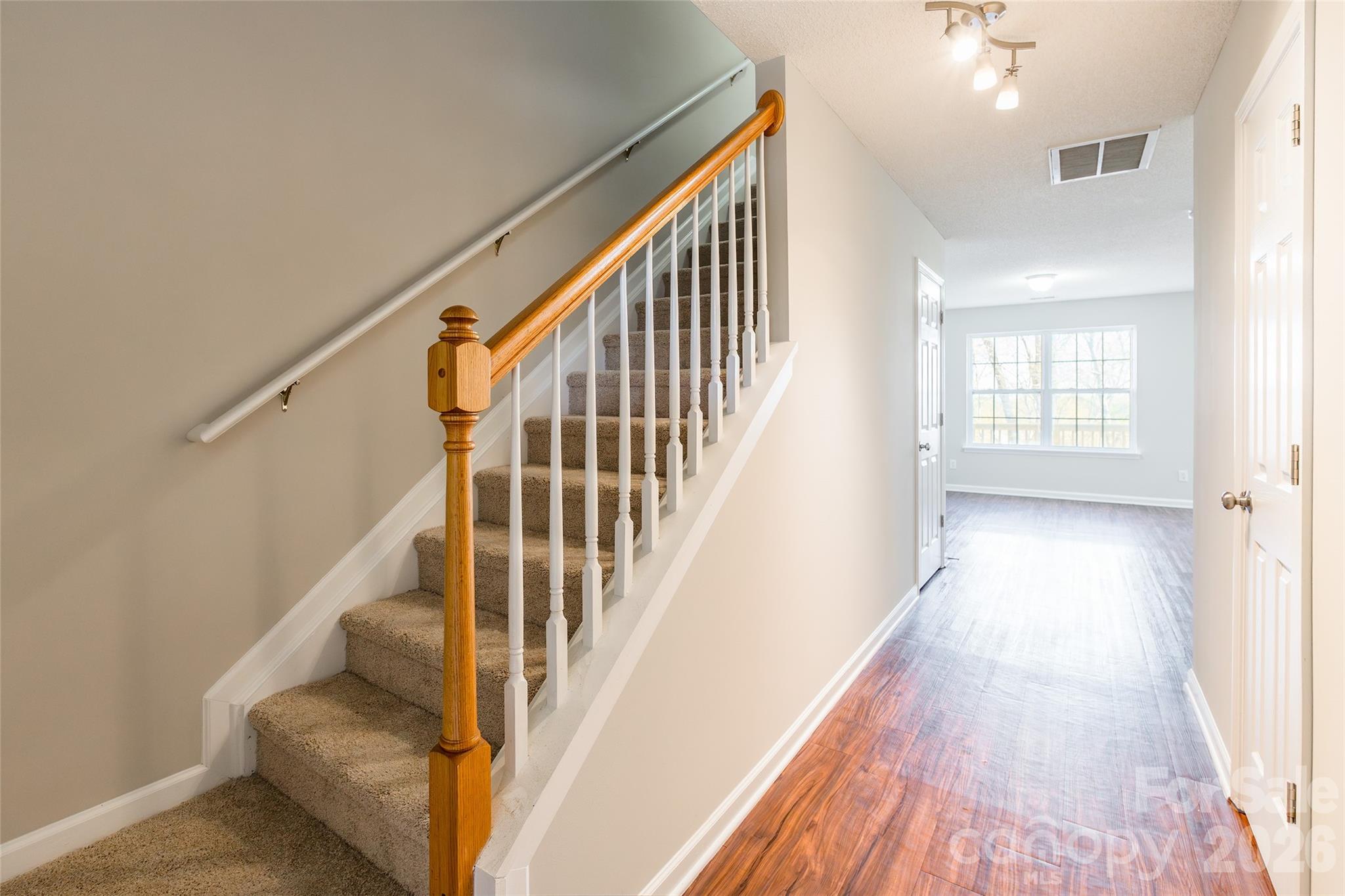 3167 Caldwell Ridge Parkway Charlotte, NC 28213 - Photo 3 of 36 a view of an entryway with wooden floor