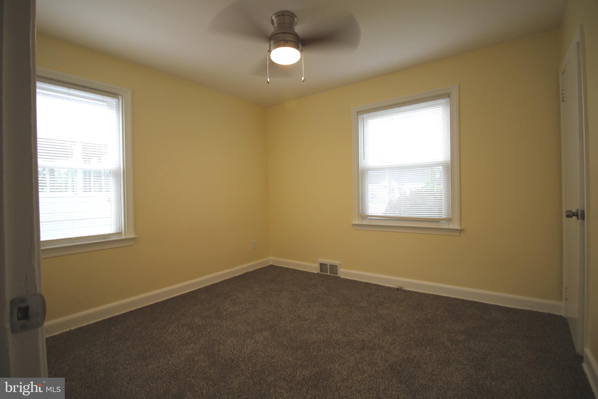 209 Champlain Avenue Wilmington, DE 19804 - Photo 12 of 26 an empty room with a window