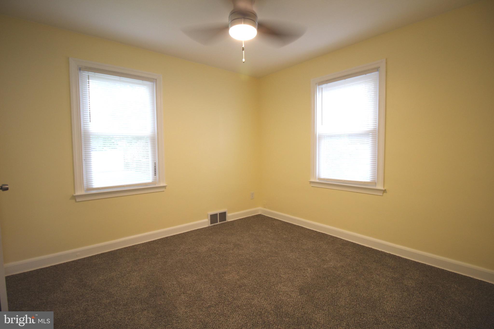 209 Champlain Avenue Wilmington, DE 19804 - Photo 13 of 26 an empty room with a window