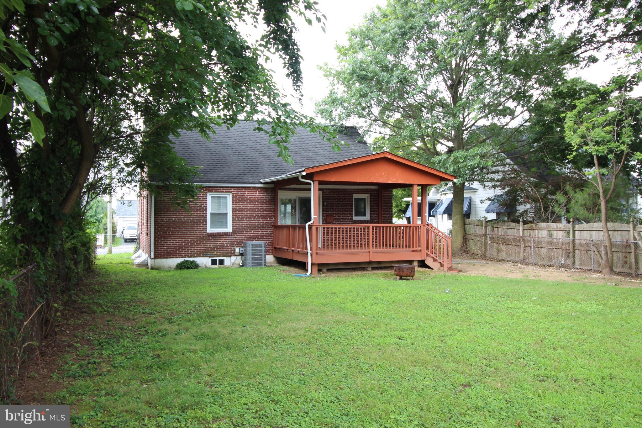 209 Champlain Avenue Wilmington, DE 19804 - Photo 24 of 26 a view of a house with a yard and sitting area