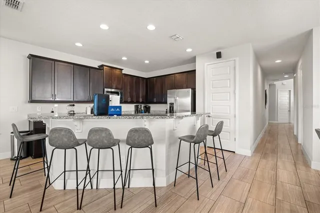 $980,000 | 1113 Castle Pines Court, Reunion, FL 34747