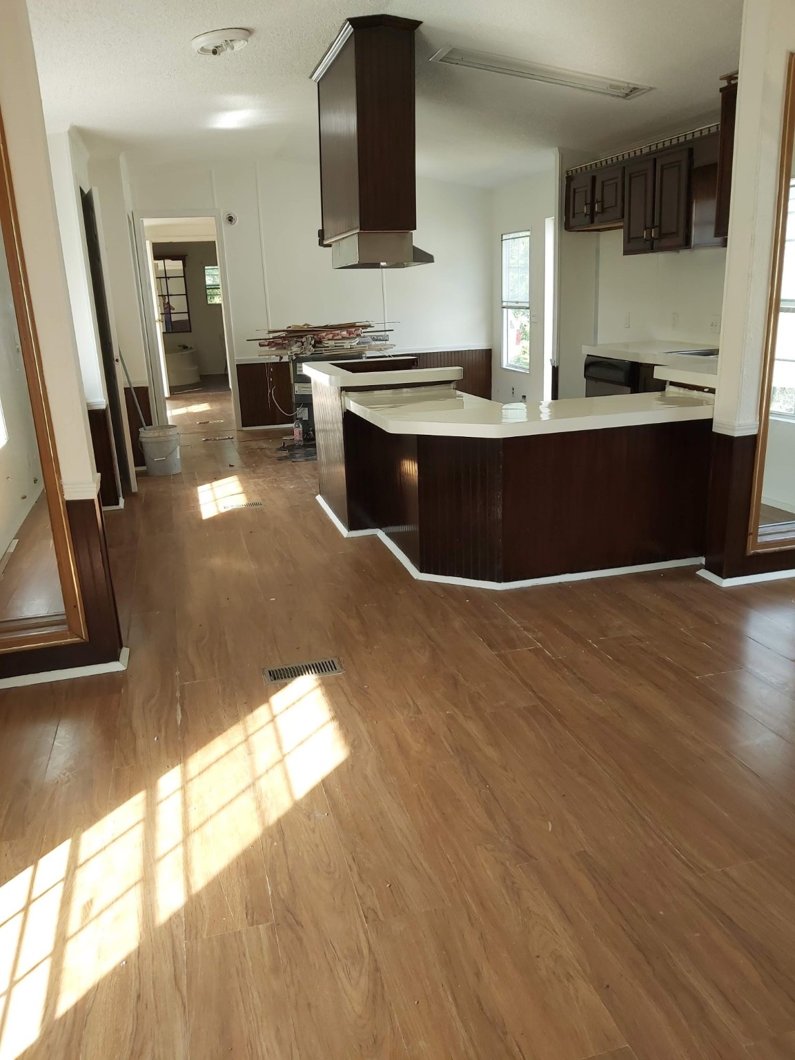 5807 Fletcher Street Crosby, TX 77532 - Photo 14 of 38 a kitchen with stainless steel appliances granite countertop a sink a stove and a wooden floors