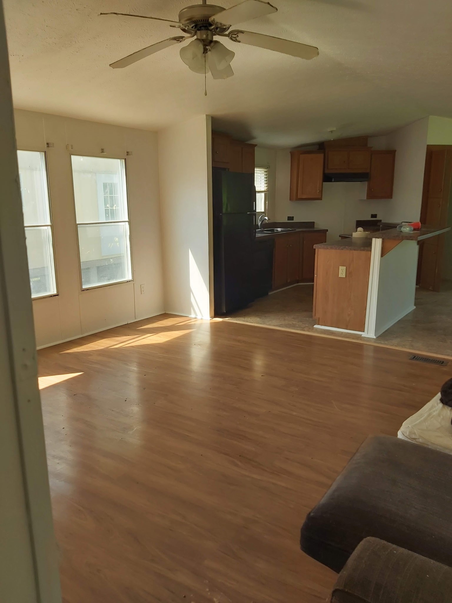 5807 Fletcher Street Crosby, TX 77532 - Photo 22 of 38 a view of a kitchen with a sink cabinets and wooden floor