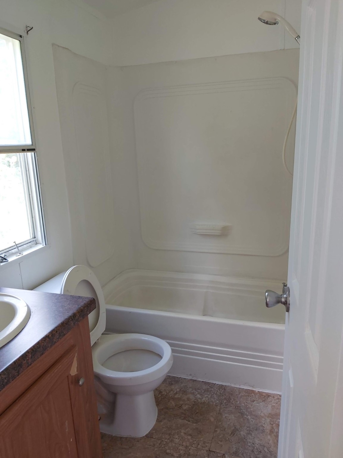 5807 Fletcher Street Crosby, TX 77532 - Photo 27 of 38 a bathroom with a toilet and a sink