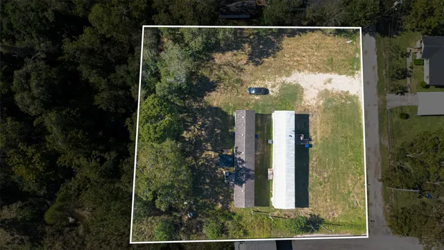 view of a small yard from a balcony