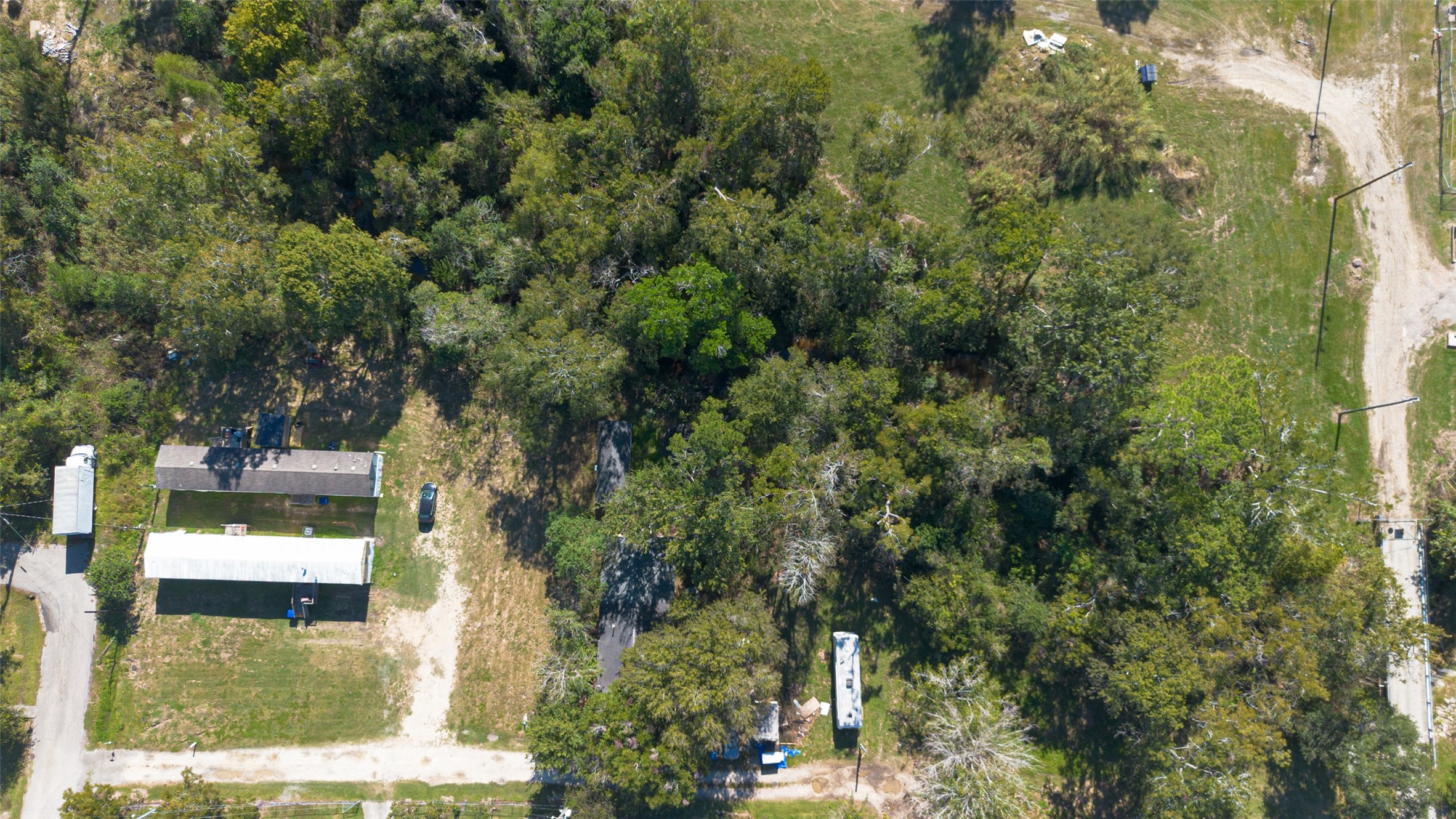 5807 Fletcher Street Crosby, TX 77532 - Photo 34 of 38 a view of a house with a yard