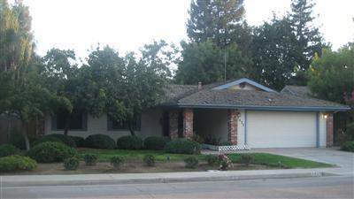 Beautiful Home in desirable neighborhood, 3 bedroom 2 Bath, Walk in closet in Master bedroom, brick firplace in living roomTile floors in the kitchen, eating area and baths, Tile counter tops in kitchen and baths, tile shower walls, wood floors in livingroom, bedrooms, hall, concrete foundation, washer and dryer hook up in garage, electric stove, microwave, dishwasher, disposal, stucco exterior, wood shake roof, 2 car garage, front porch, A/C, Covered Patio, Inground Pool, mature landscaping, front yard auto sprinklers, concrete driveway.