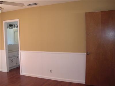 1425 West Flora Avenue Reedley, CA 93654 - Photo 20 of 48 Master Bedroom, Wood Floor, ceiling fan, fresh paint.