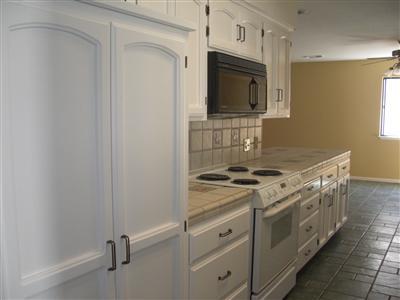 1425 West Flora Avenue Reedley, CA 93654 - Photo 31 of 48 Kitchen, Tile floor.
